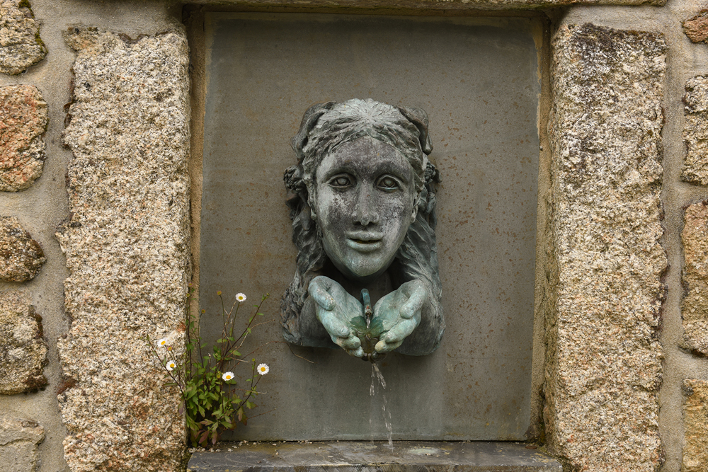 Spout-of-a-Water-Feature-in-a-Granite-Wa